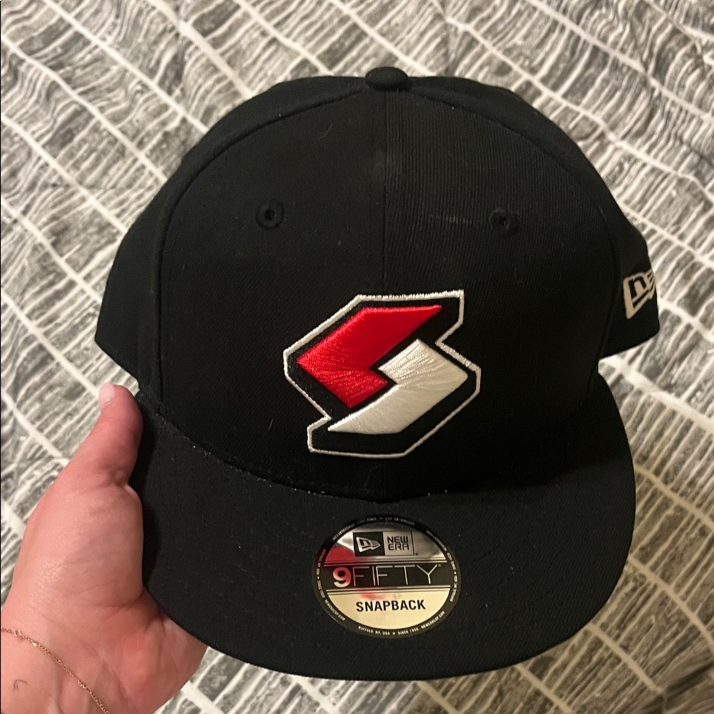 New Era Black Snapback Hat with Red & White Patch